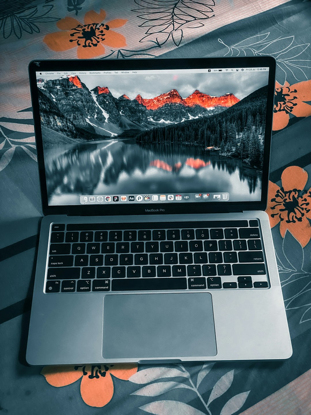 macbook on bed
